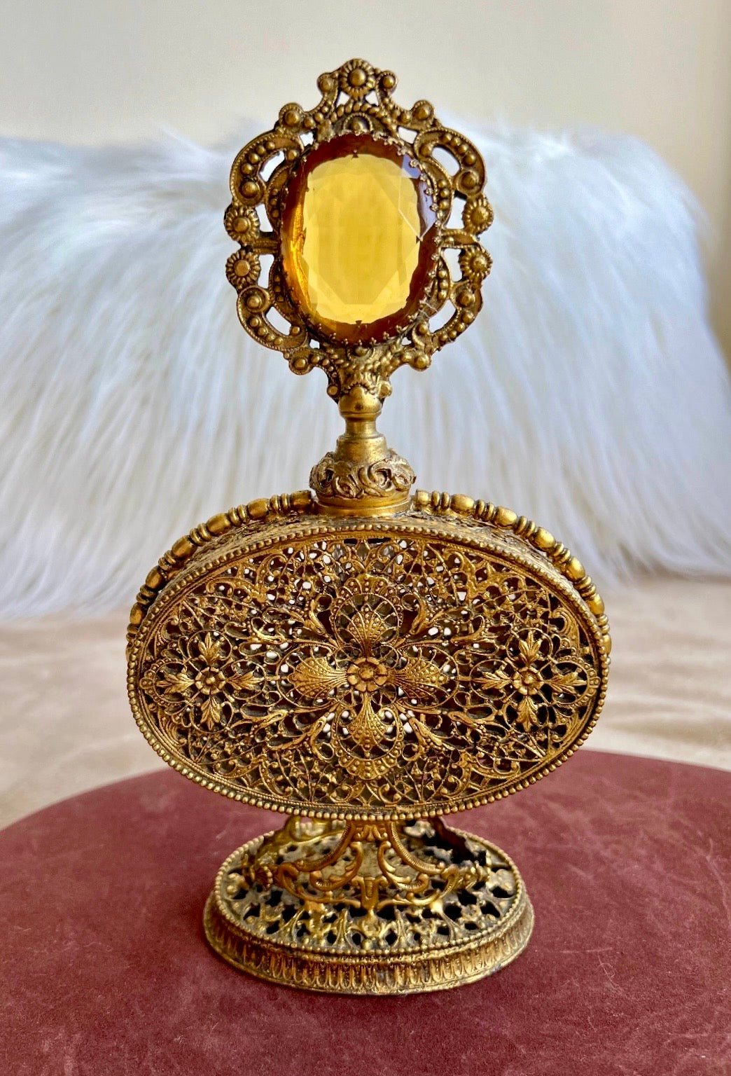1950s or 1960s Hollywood Regency Style Vintage Ormolu Filigree Gilded Brass Perfume Bottle with a Large Yellow Rhinestone on the Top