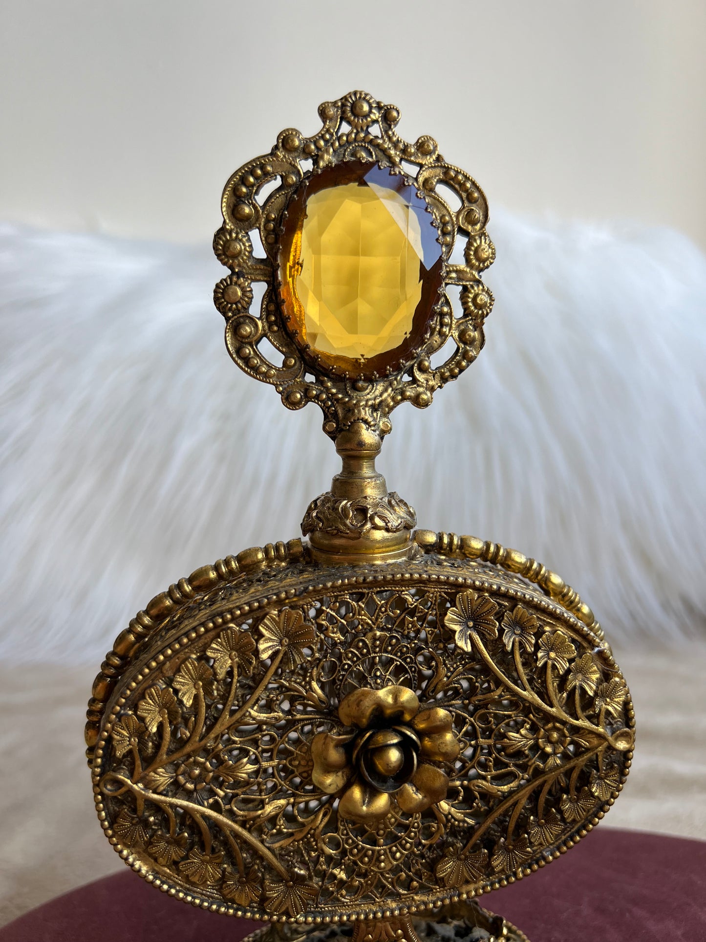 1950s or 1960s Hollywood Regency Style Vintage Ormolu Filigree Gilded Brass Perfume Bottle with a Large Yellow Rhinestone on the Top