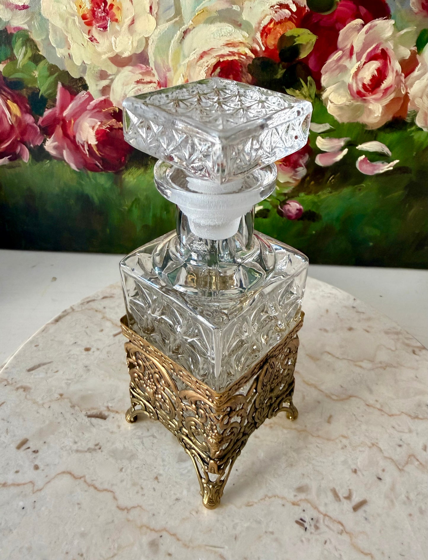Antique Style Hollywood Regency Perfume Bottle features an Ornate Gold-plated Filigree Holder
