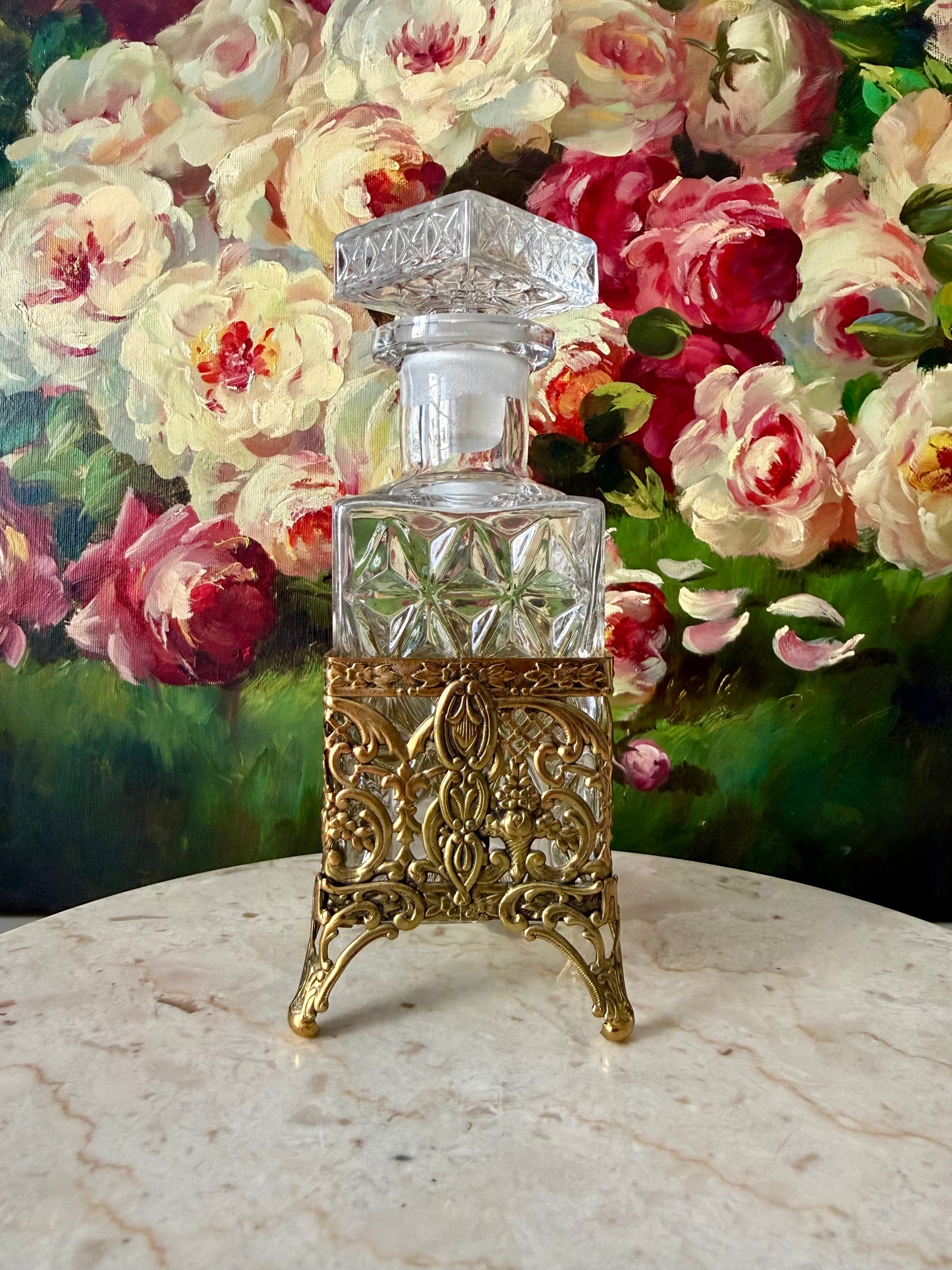 Antique Style Hollywood Regency Perfume Bottle features an Ornate Gold-plated Filigree Holder