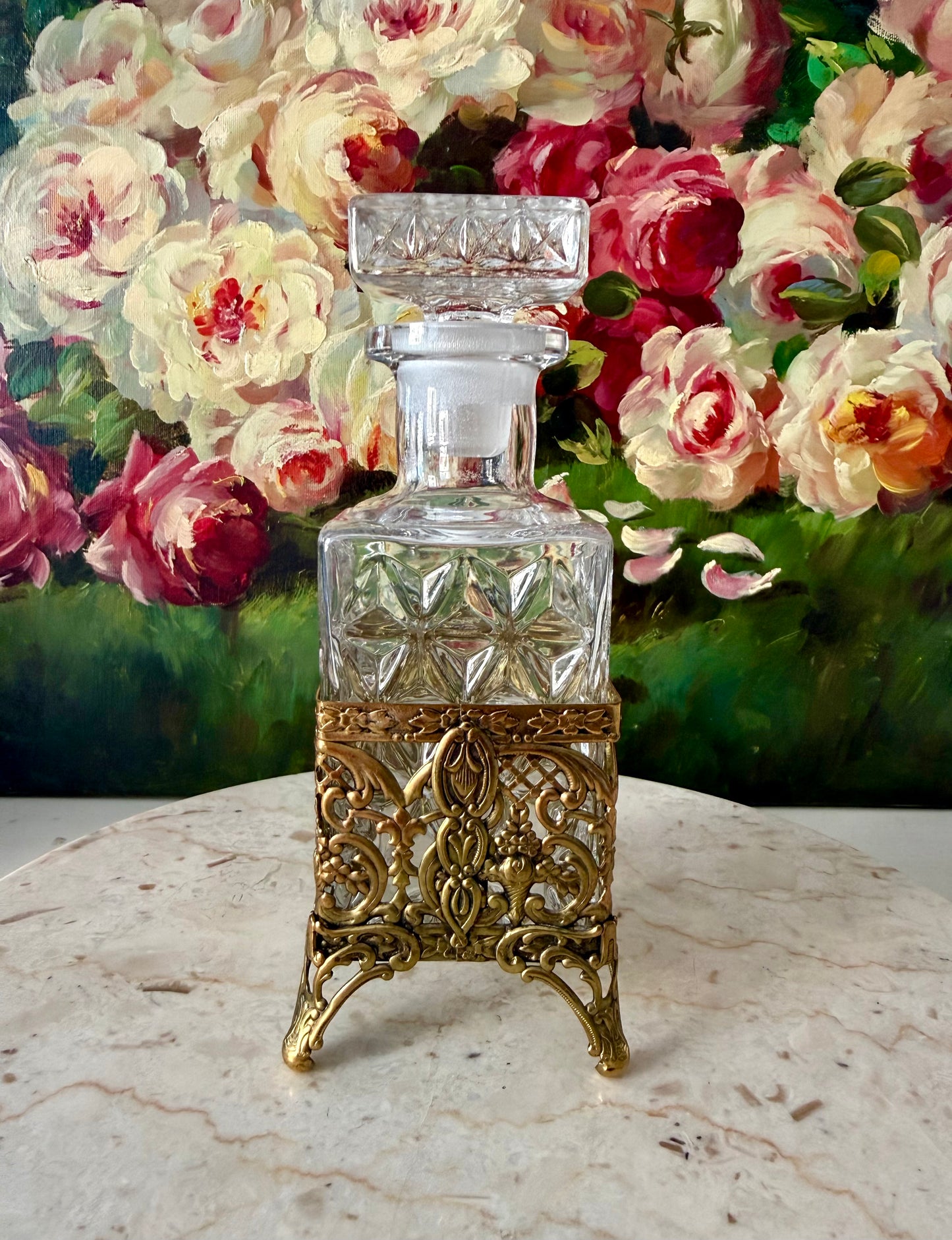 Antique Style Hollywood Regency Perfume Bottle features an Ornate Gold-plated Filigree Holder