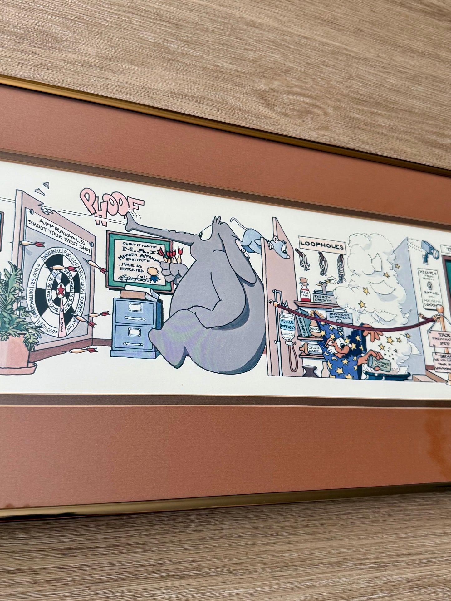 Vintage Framed Cartoon Artwork is titled “Financial Planners”, Signed and Numbered by Robert Marble in 1982 - 50/750
