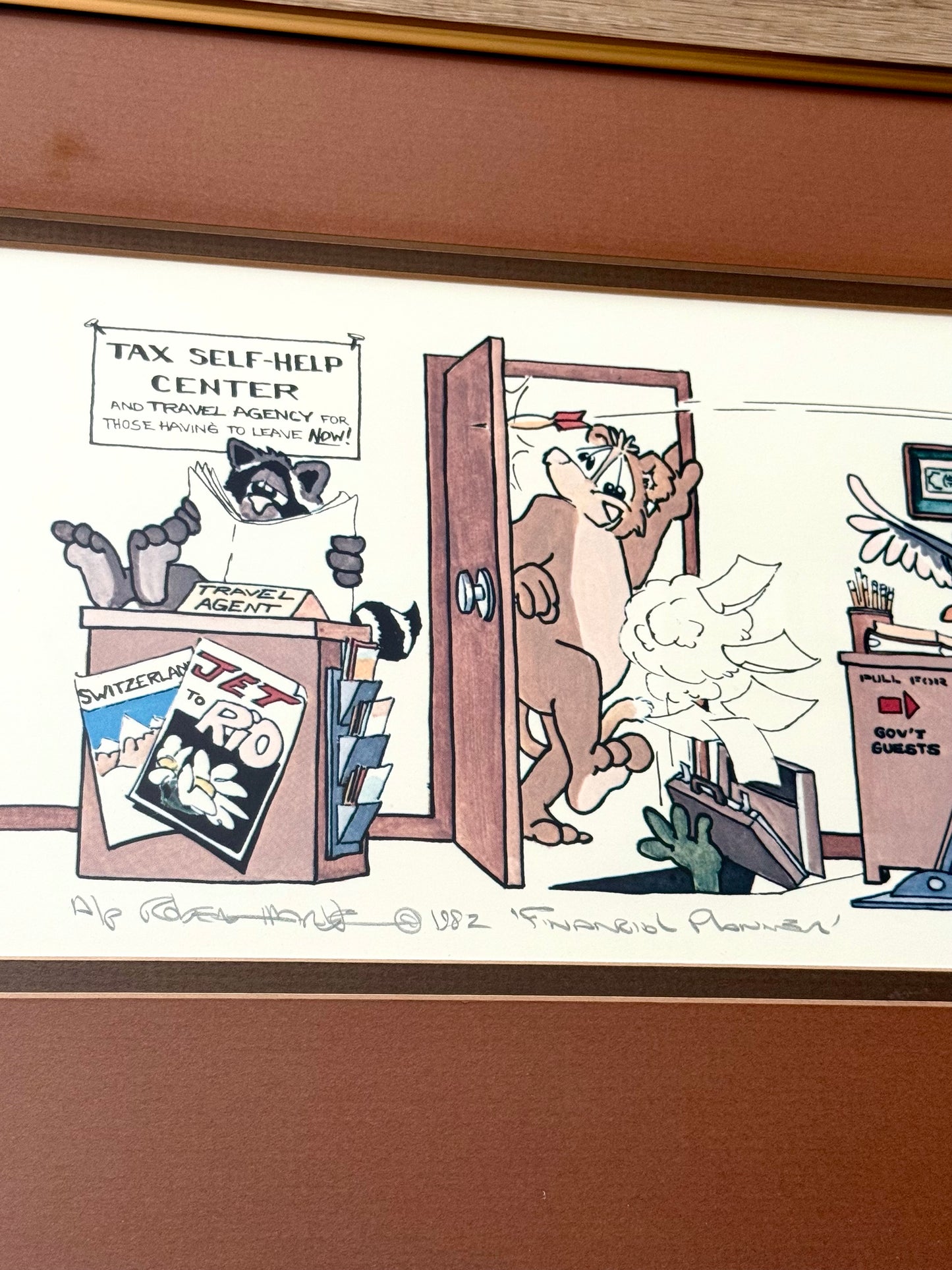 Vintage Framed Cartoon Artwork is titled “Financial Planners”, Signed and Numbered by Robert Marble in 1982 - 50/750