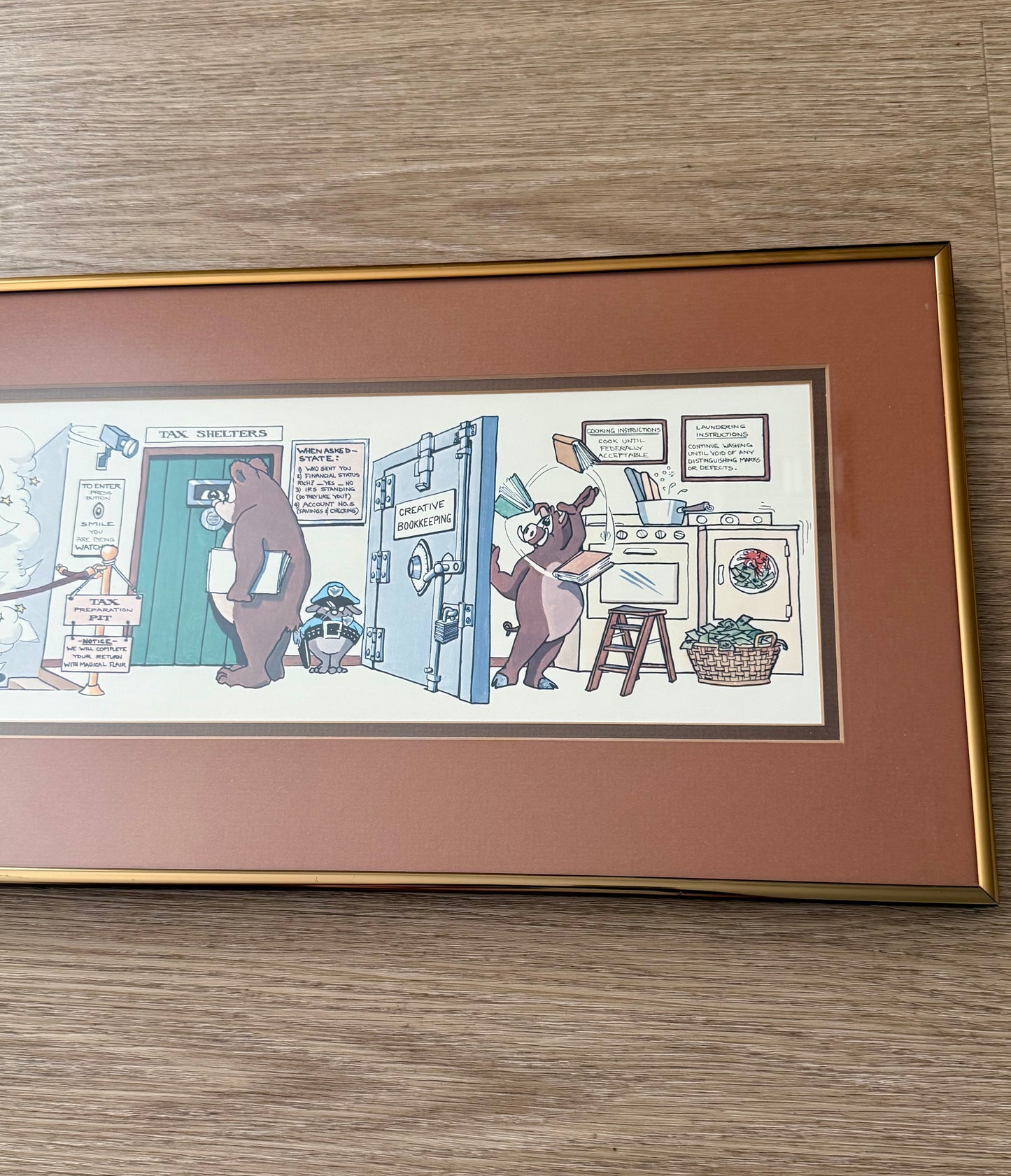 Vintage Framed Cartoon Artwork is titled “Financial Planners”, Signed and Numbered by Robert Marble in 1982 - 50/750