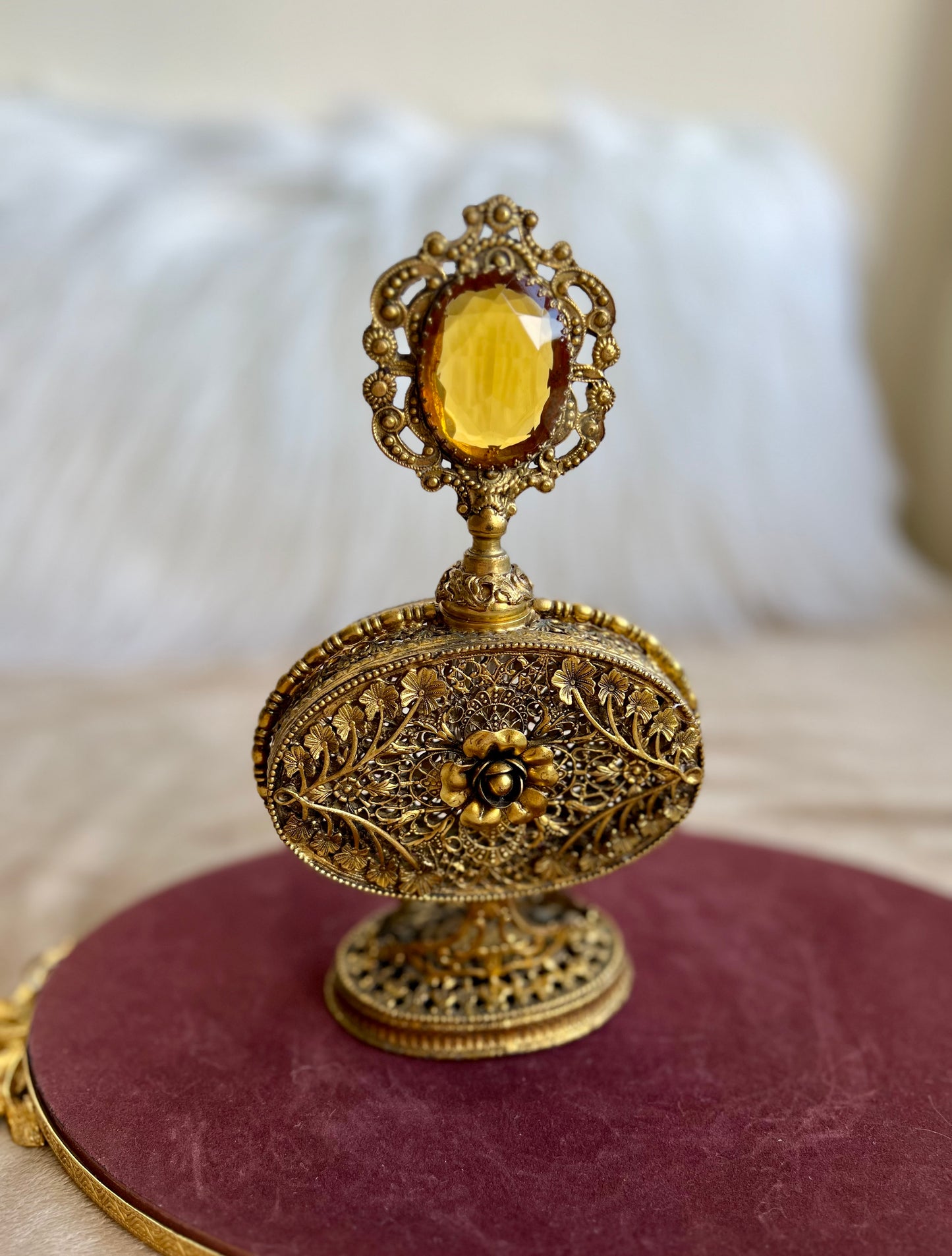 1950s or 1960s Hollywood Regency Style Vintage Ormolu Filigree Gilded Brass Perfume Bottle with a Large Yellow Rhinestone on the Top