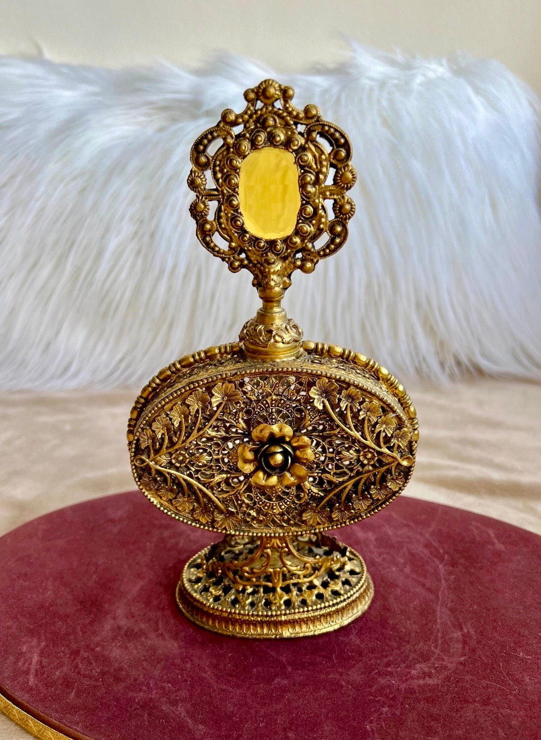 1950s or 1960s Hollywood Regency Style Vintage Ormolu Filigree Gilded Brass Perfume Bottle with a Large Yellow Rhinestone on the Top