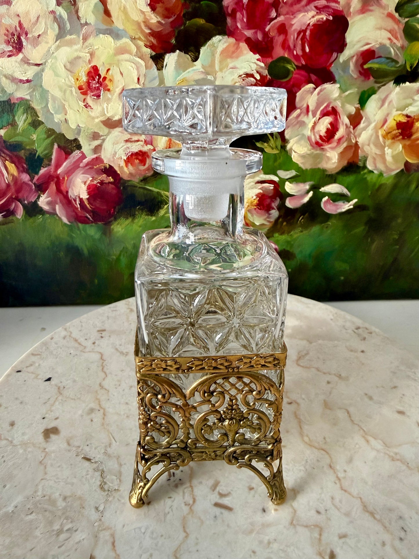 Antique Style Hollywood Regency Perfume Bottle features an Ornate Gold-plated Filigree Holder