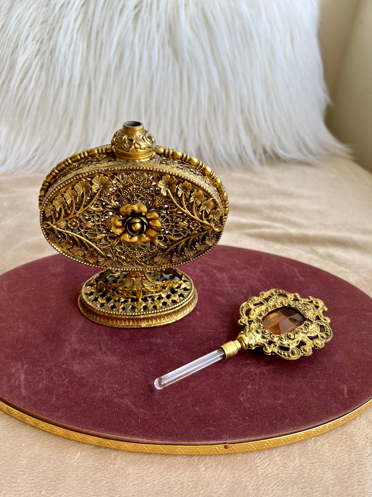 1950s or 1960s Hollywood Regency Style Vintage Ormolu Filigree Gilded Brass Perfume Bottle with a Large Yellow Rhinestone on the Top