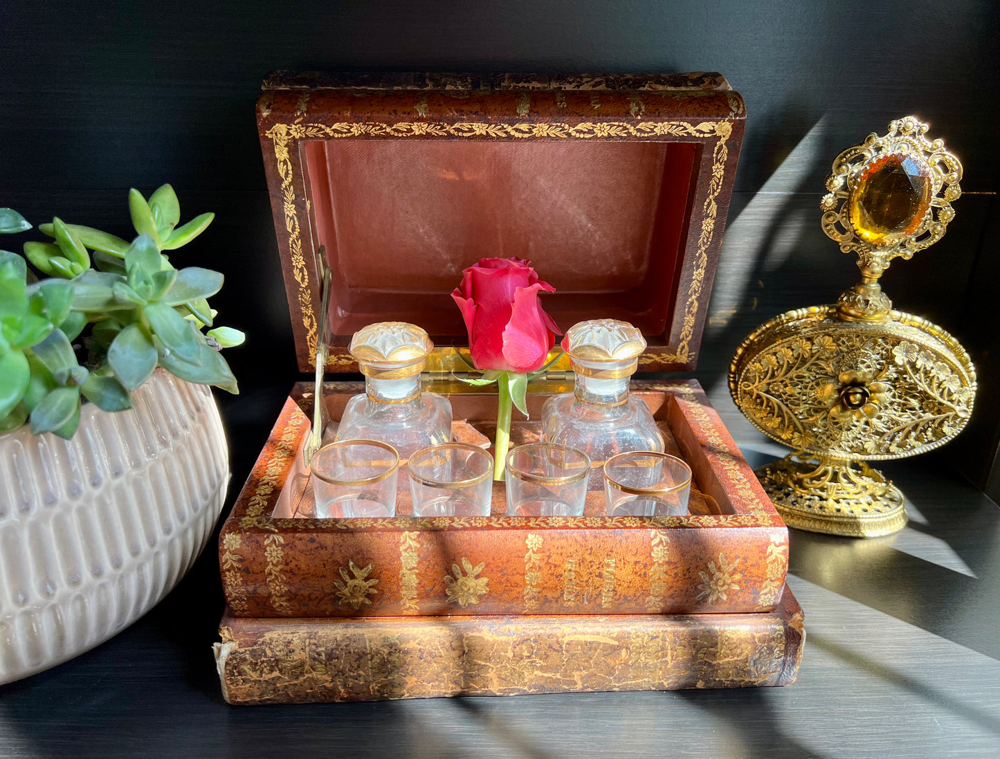 Antique Early 20th Century French Leather Book Tantalus Box with 4 Shot Glasses and 2 Decanters