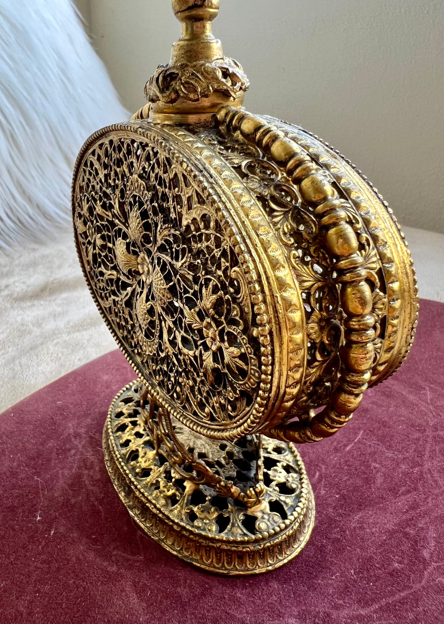 1950s or 1960s Hollywood Regency Style Vintage Ormolu Filigree Gilded Brass Perfume Bottle with a Large Yellow Rhinestone on the Top