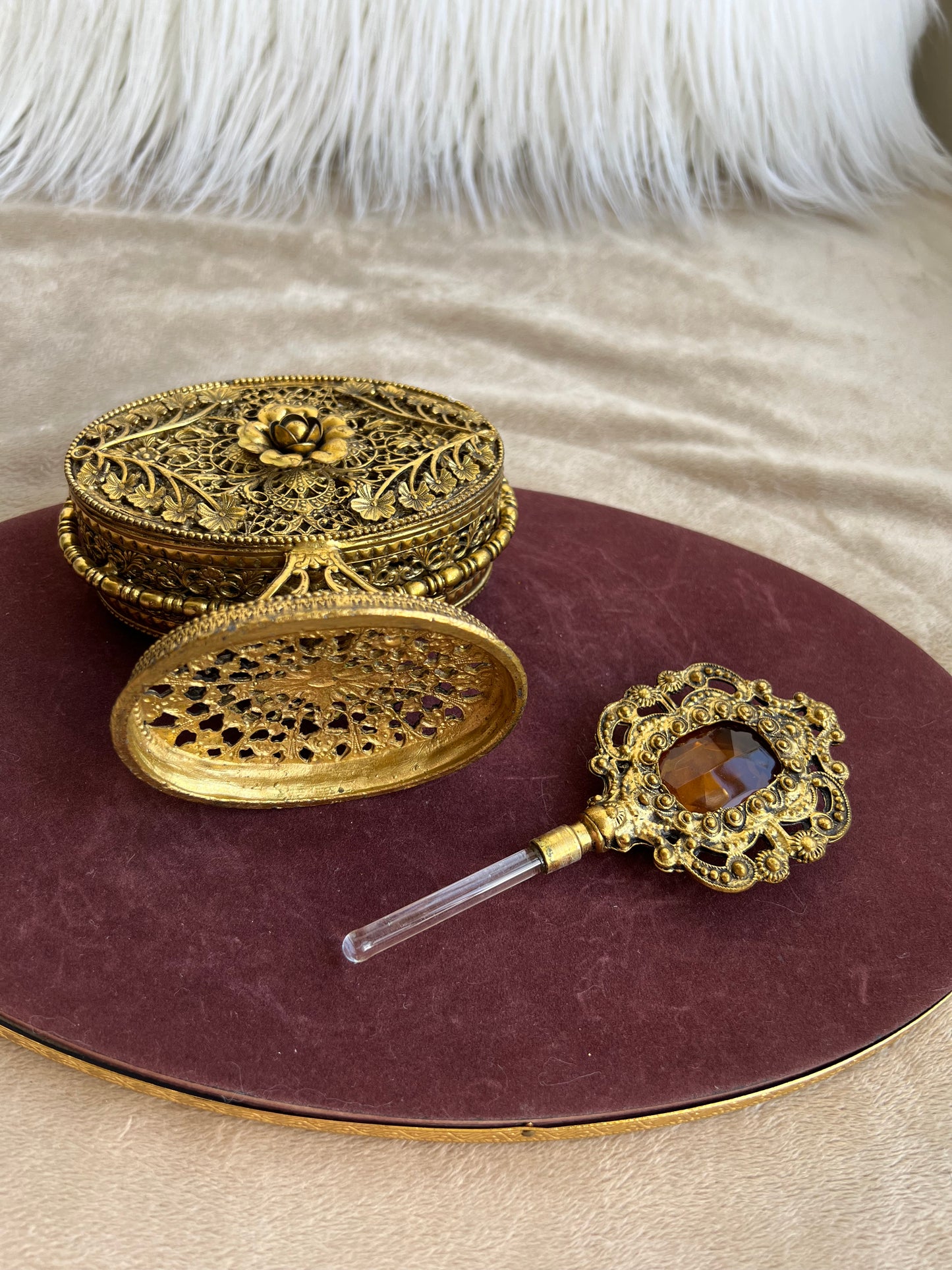 1950s or 1960s Hollywood Regency Style Vintage Ormolu Filigree Gilded Brass Perfume Bottle with a Large Yellow Rhinestone on the Top