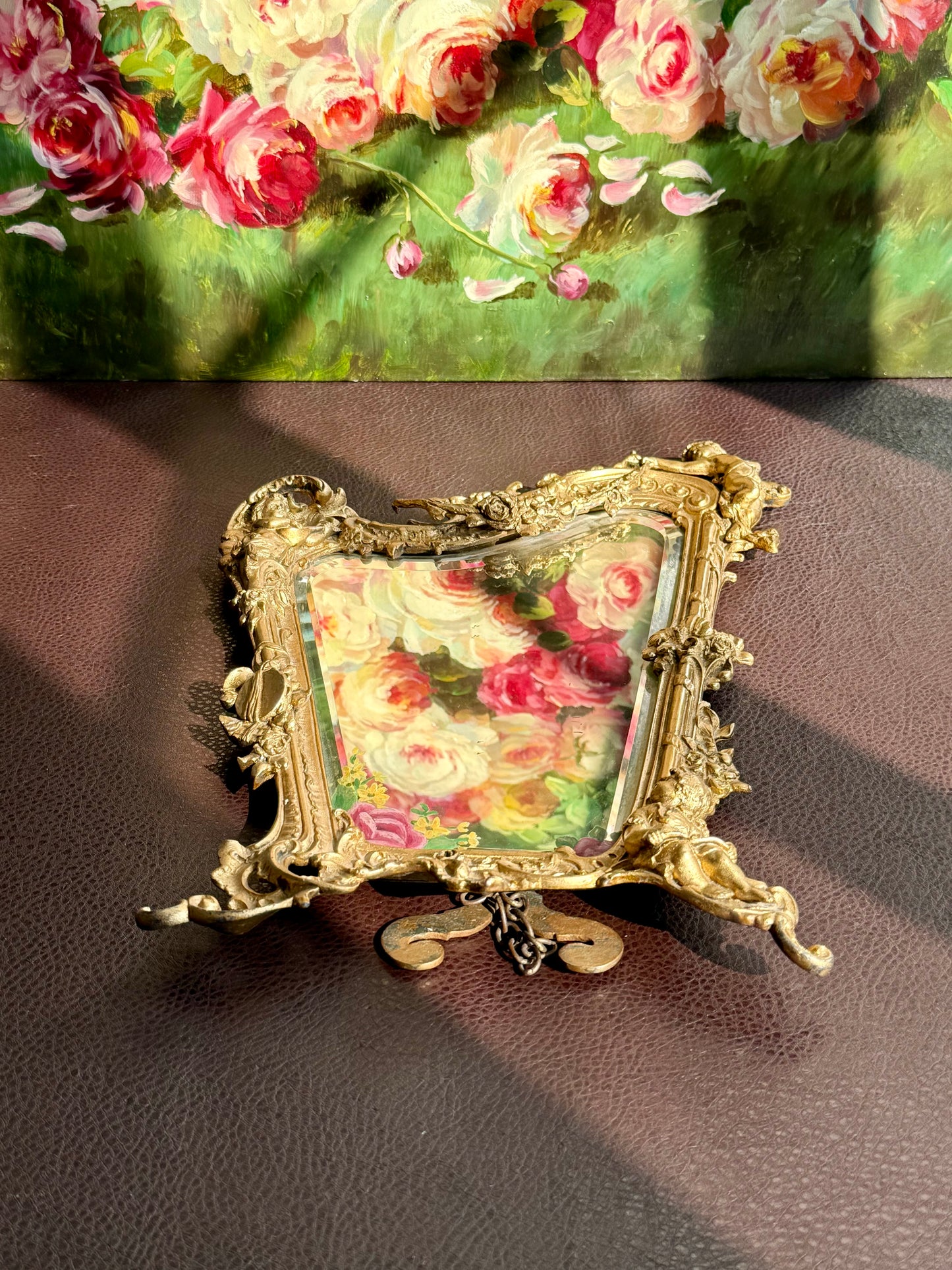 Antique Italian Rococo-Style Table Mirror with Gilded Frame, Featuring Putti (cherubs) Decor and Floral Painting