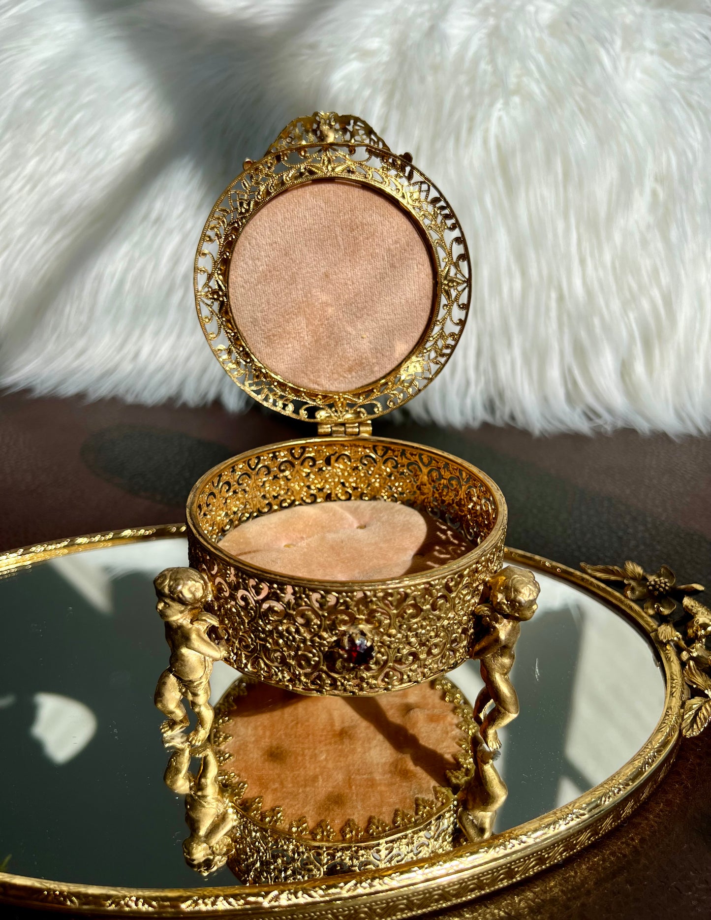 Three Footed Cherub Round Vintage Design Jewelry Casket/ Box with Pink Plush on the Top and Inside & Burgundy Red Stones Decoration