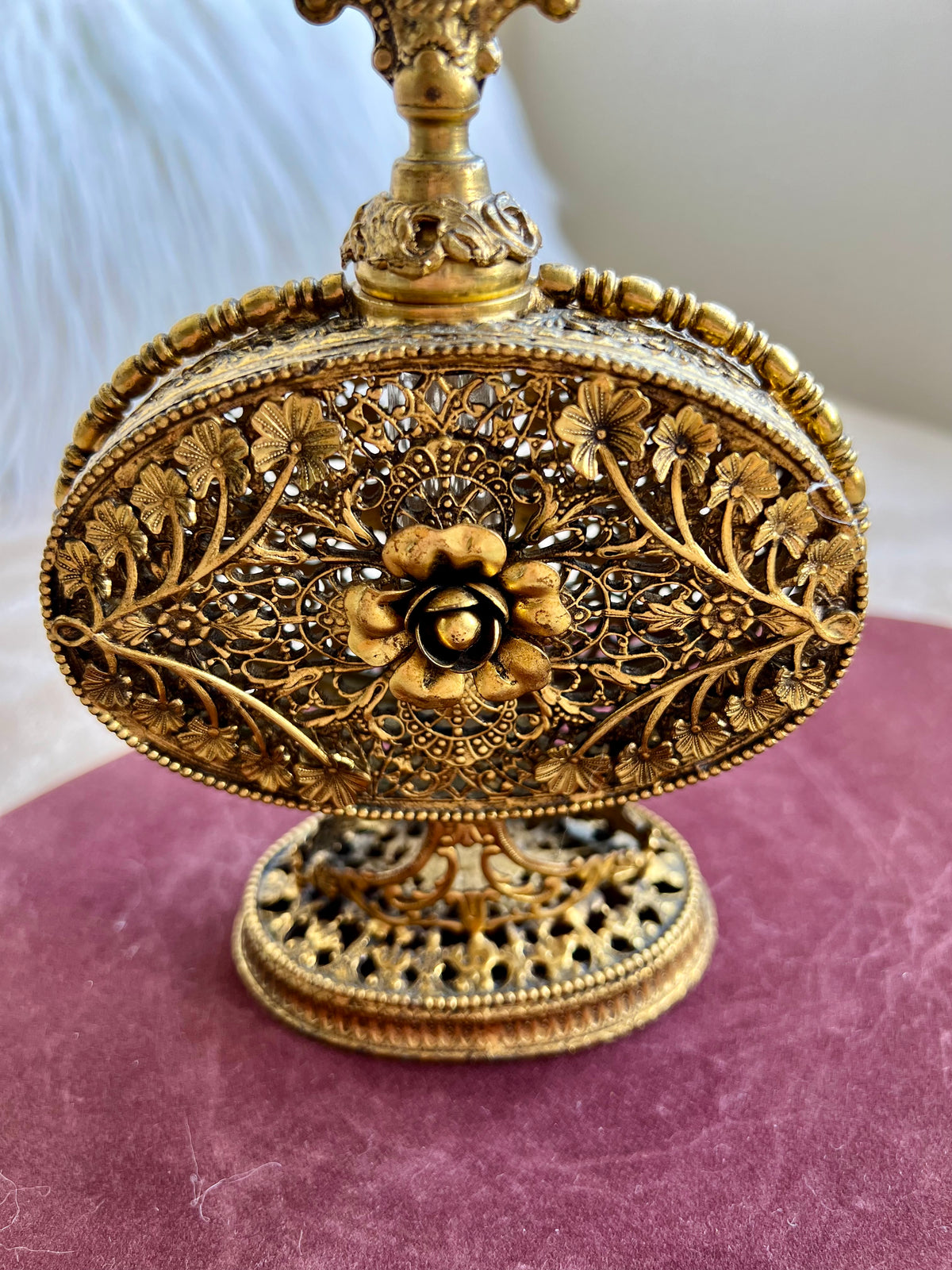 1950s or 1960s Hollywood Regency Style Vintage Ormolu Filigree Gilded Brass Perfume Bottle with a Large Yellow Rhinestone on the Top
