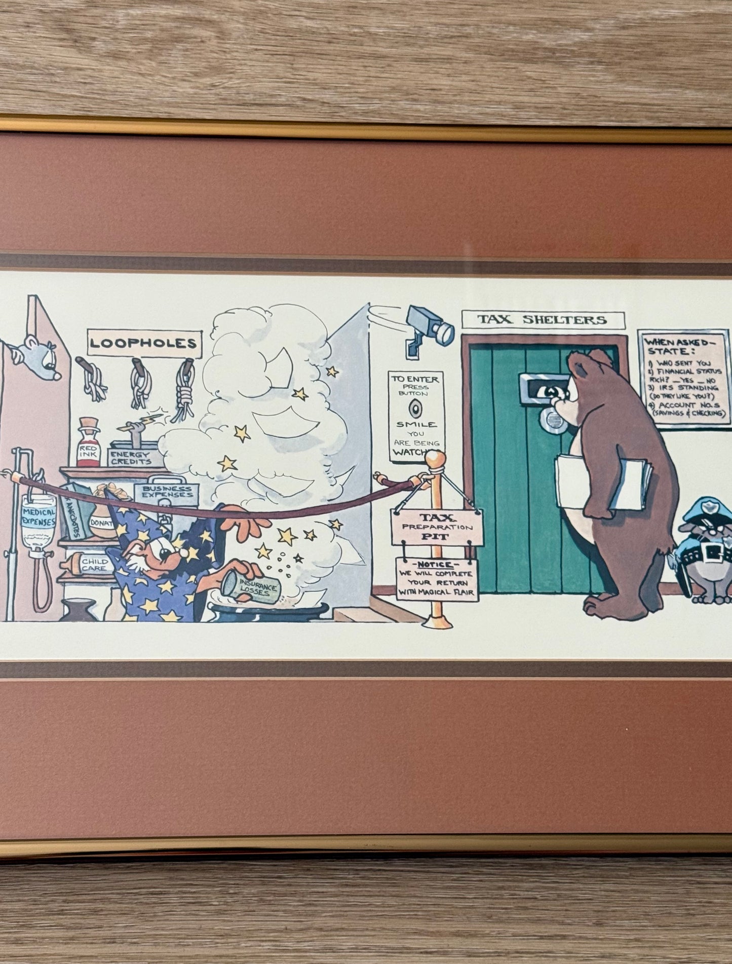 Vintage Framed Cartoon Artwork is titled “Financial Planners”, Signed and Numbered by Robert Marble in 1982 - 50/750