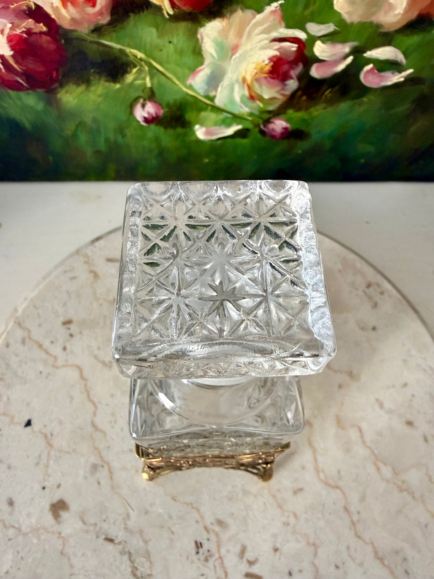 Antique Style Hollywood Regency Perfume Bottle features an Ornate Gold-plated Filigree Holder