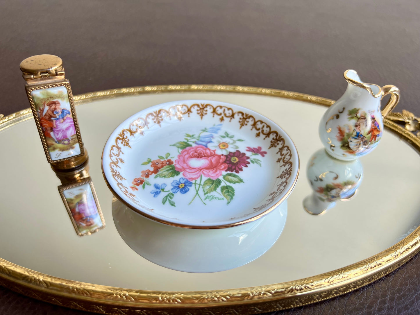 Limoges porcelain and gilded metal lipstick case with mirror