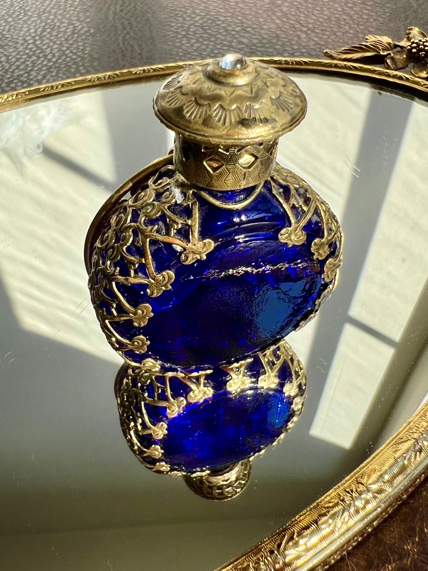 Czech Vintage Small Blue Glass Perfume Bottle with Brass Filigree Overlay Rhinestones and Black Onyx