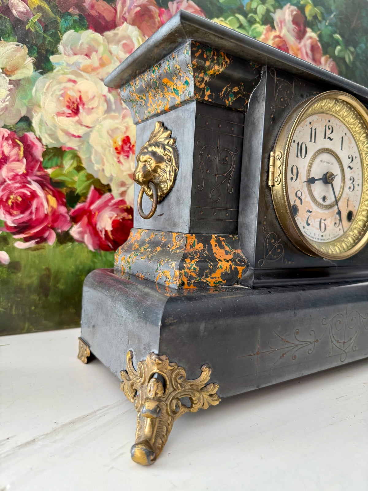 Antique Adamantine Seth Thomas Wooden Mantel Clock from the Late 19th or Early 20th Century with Lion Heads - Working