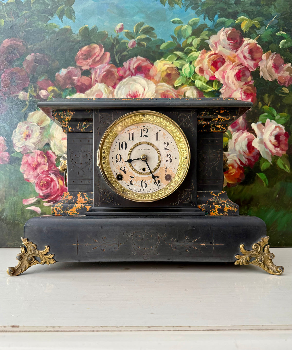 Antique Adamantine Seth Thomas Wooden Mantel Clock from the Late 19th or Early 20th Century with Lion Heads - Working