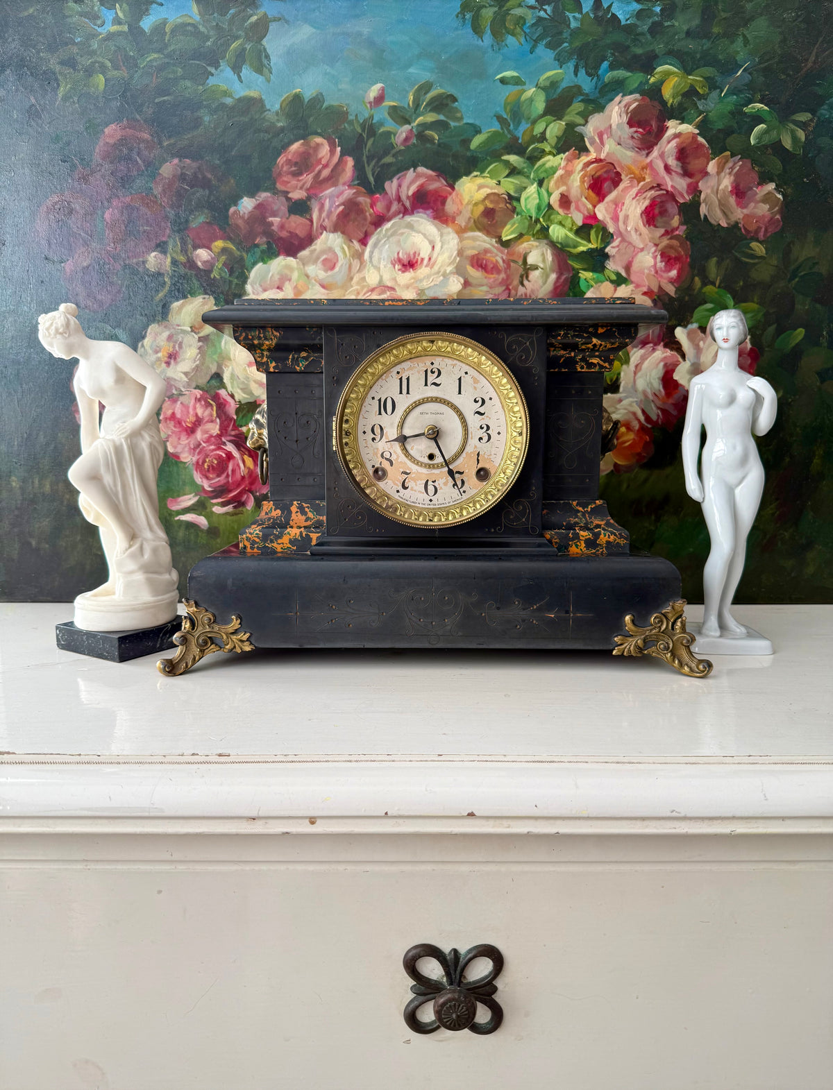 Antique Adamantine Seth Thomas Wooden Mantel Clock from the Late 19th or Early 20th Century with Lion Heads - Working