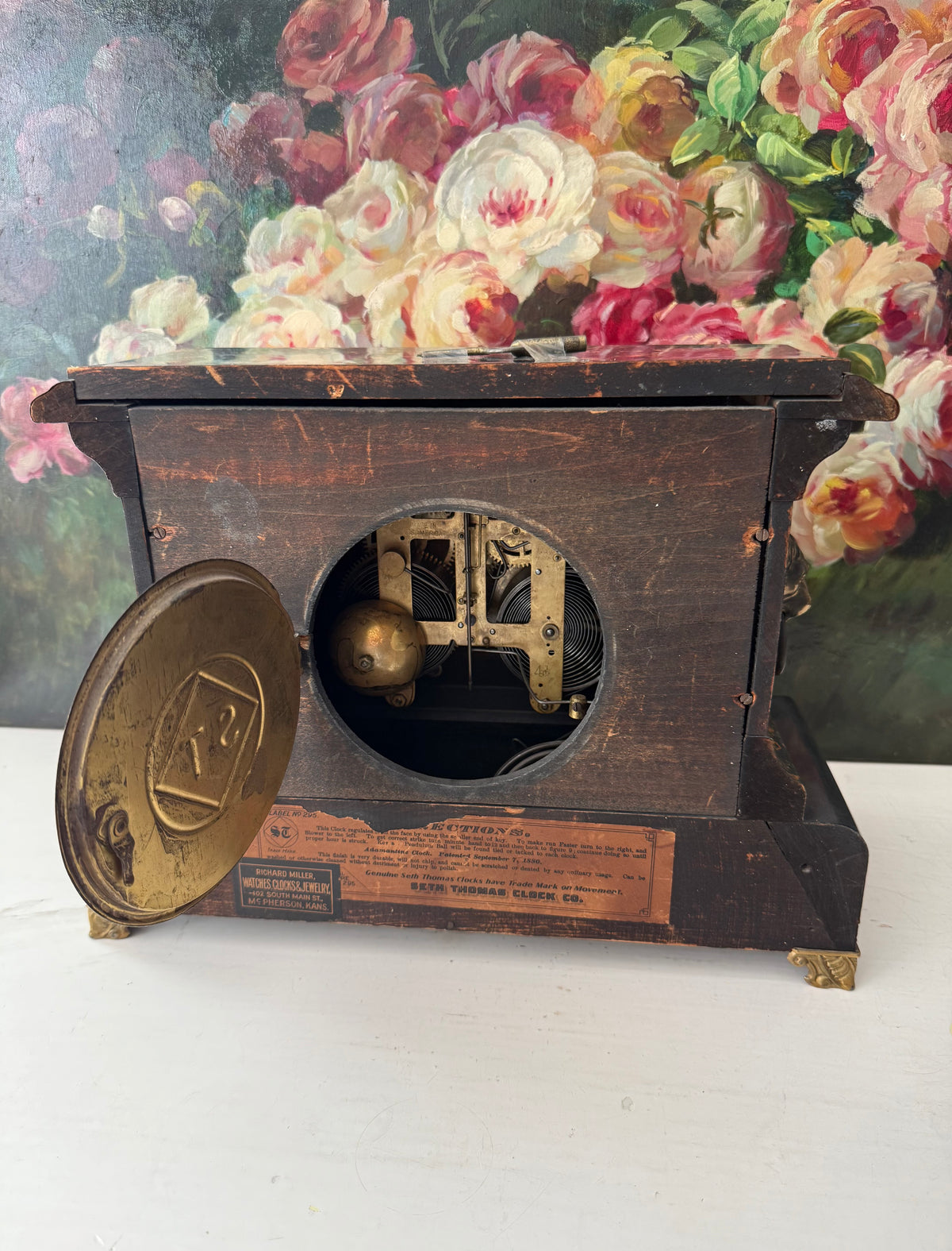 Antique Adamantine Seth Thomas Wooden Mantel Clock from the Late 19th or Early 20th Century with Lion Heads - Working