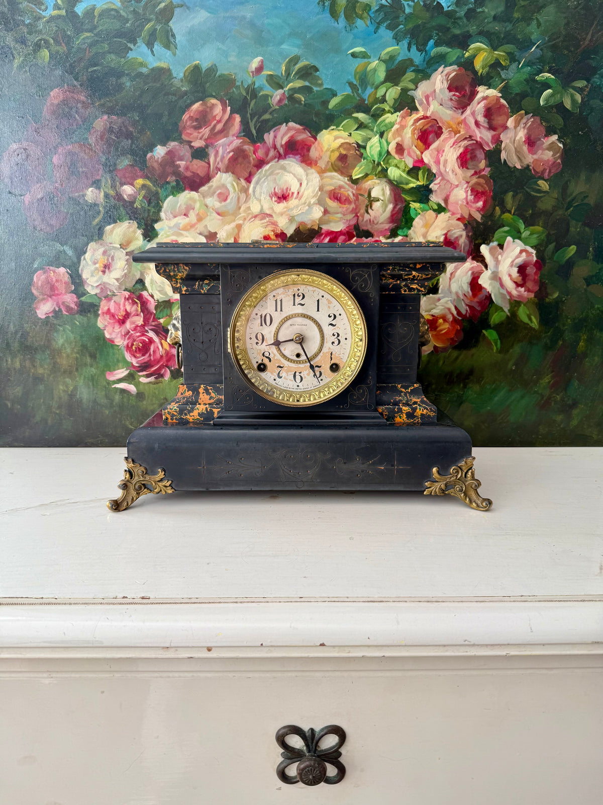 Antique Adamantine Seth Thomas Wooden Mantel Clock from the Late 19th or Early 20th Century with Lion Heads - Working