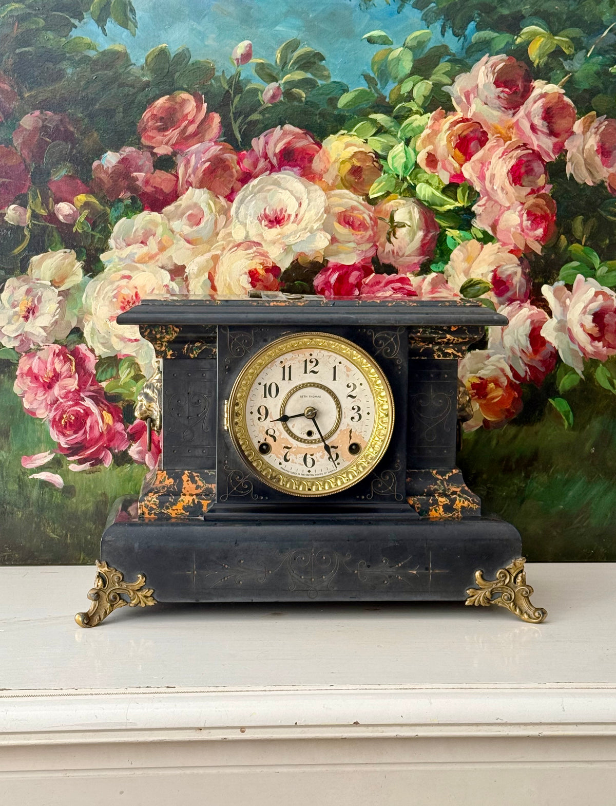 Antique Adamantine Seth Thomas Wooden Mantel Clock from the Late 19th or Early 20th Century with Lion Heads - Working