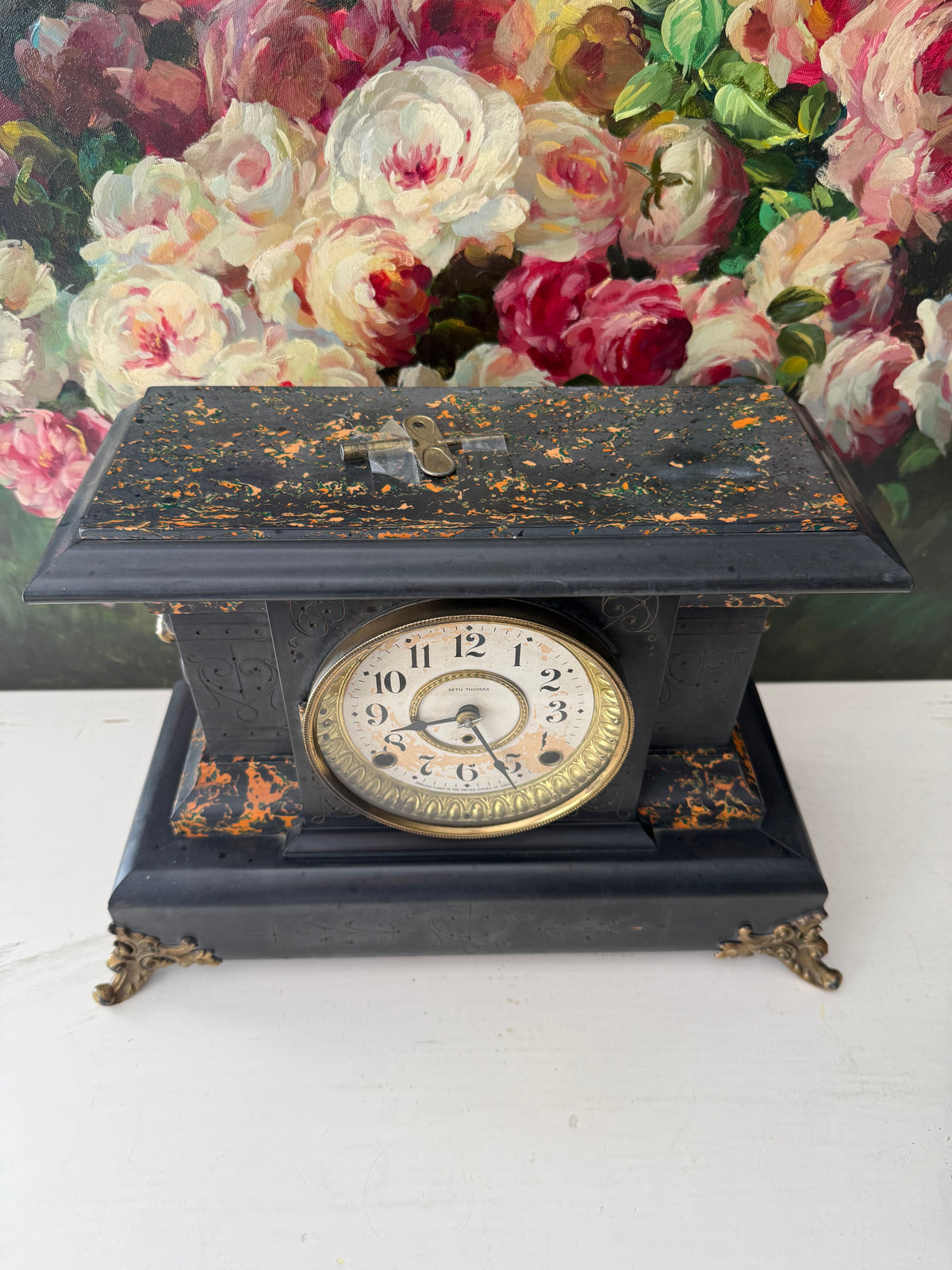 Antique Adamantine Seth Thomas Wooden Mantel Clock from the Late 19th or Early 20th Century with Lion Heads - Working