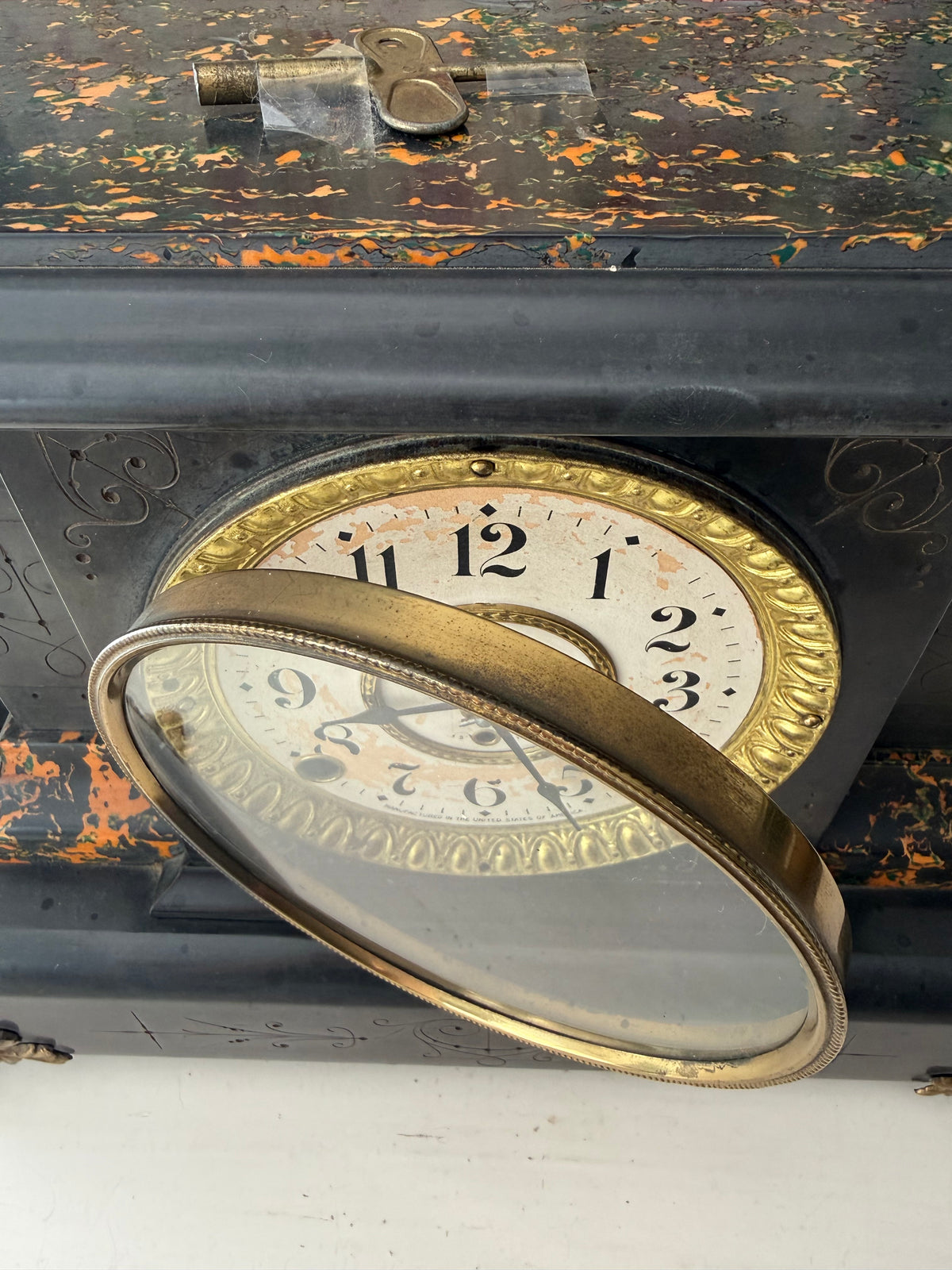 Antique Adamantine Seth Thomas Wooden Mantel Clock from the Late 19th or Early 20th Century with Lion Heads - Working