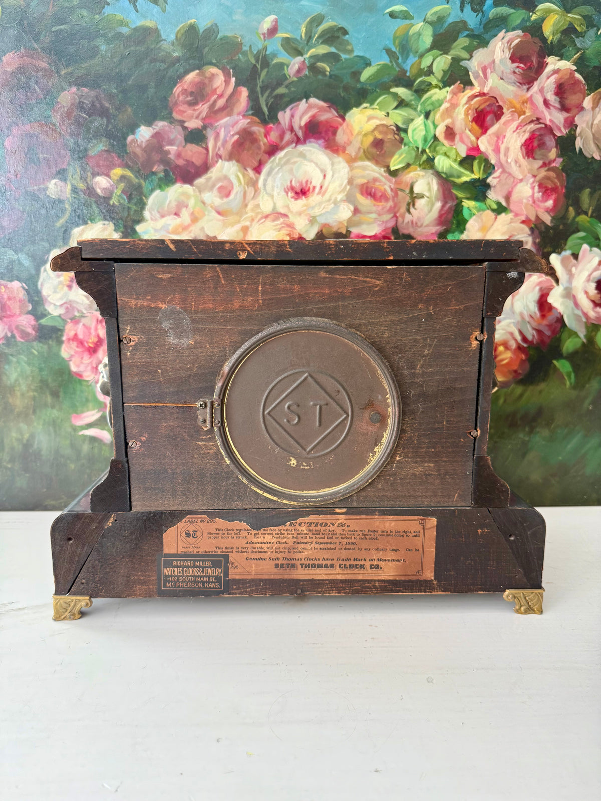 Antique Adamantine Seth Thomas Wooden Mantel Clock from the Late 19th or Early 20th Century with Lion Heads - Working