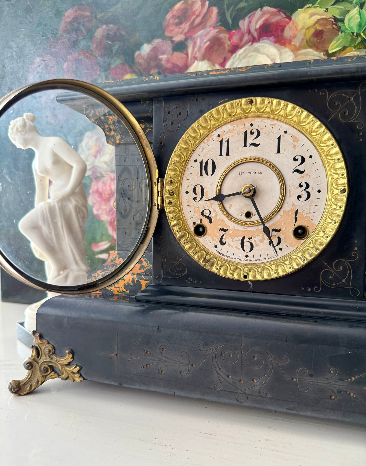 Antique Adamantine Seth Thomas Wooden Mantel Clock from the Late 19th or Early 20th Century with Lion Heads - Working