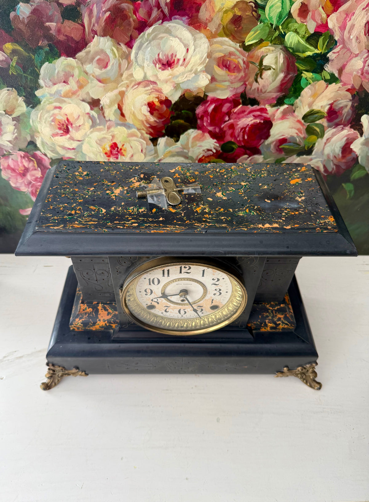 Antique Adamantine Seth Thomas Wooden Mantel Clock from the Late 19th or Early 20th Century with Lion Heads - Working